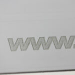 Detail of engraving on light gray Smart Cover
