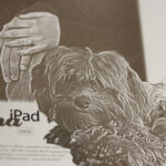 Photo of dogs laser engraved on to iPad