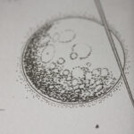 Hand-drawn moon engraving