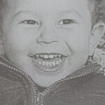 Close-up of photo engraved on iPad